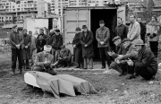 A dead teenage girl is carried into the morgue at Sarajevo's Kosevo hospital on December 6, 1993.
