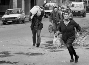 A dead teenage girl is carried into the morgue at Sarajevo's Kosevo hospital on December 6, 1993.