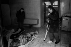 A dead teenage girl is carried into the morgue at Sarajevo's Kosevo hospital on December 6, 1993.